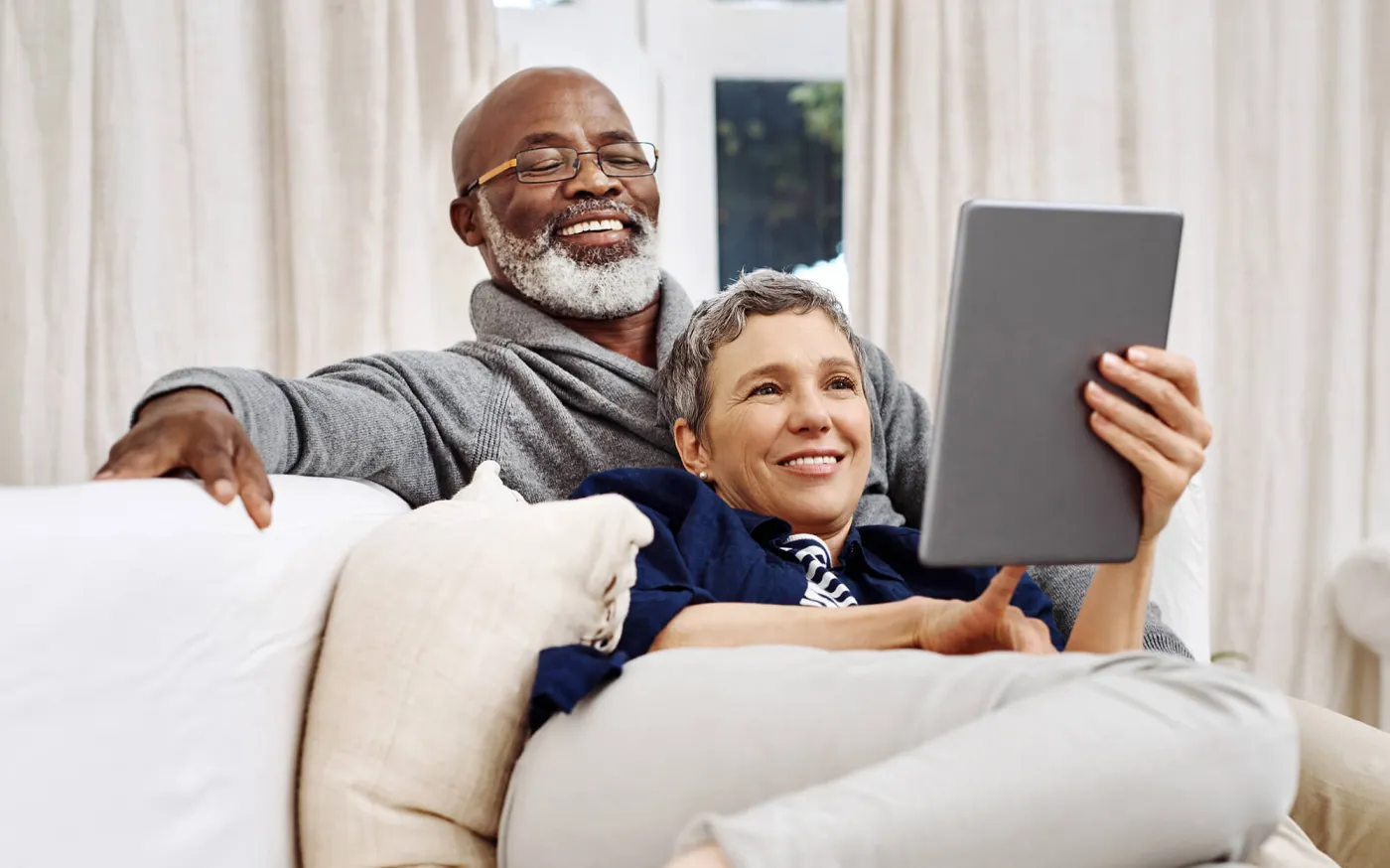 Senior couple in couch together